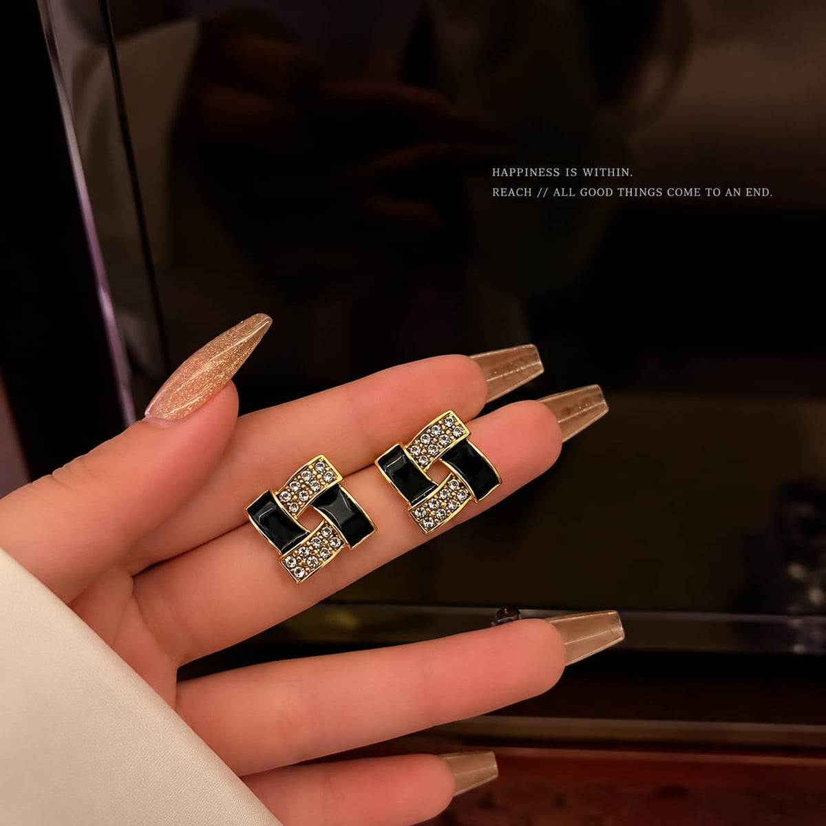 gold-plated geometric stud earrings featuring enamel