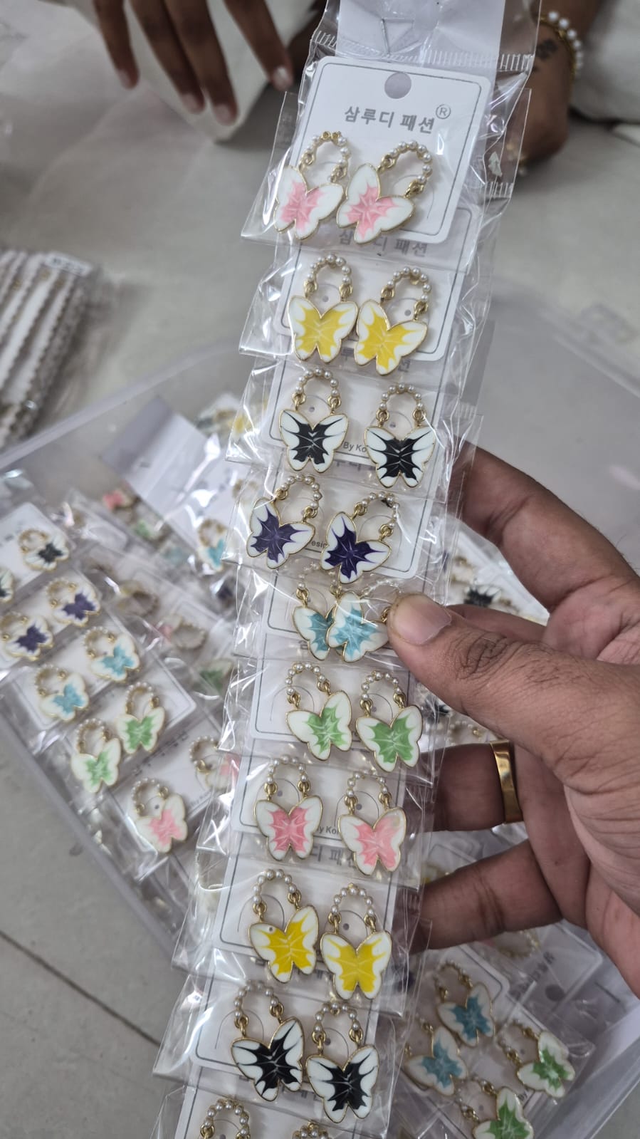 Enamel-style butterfly with golden plated