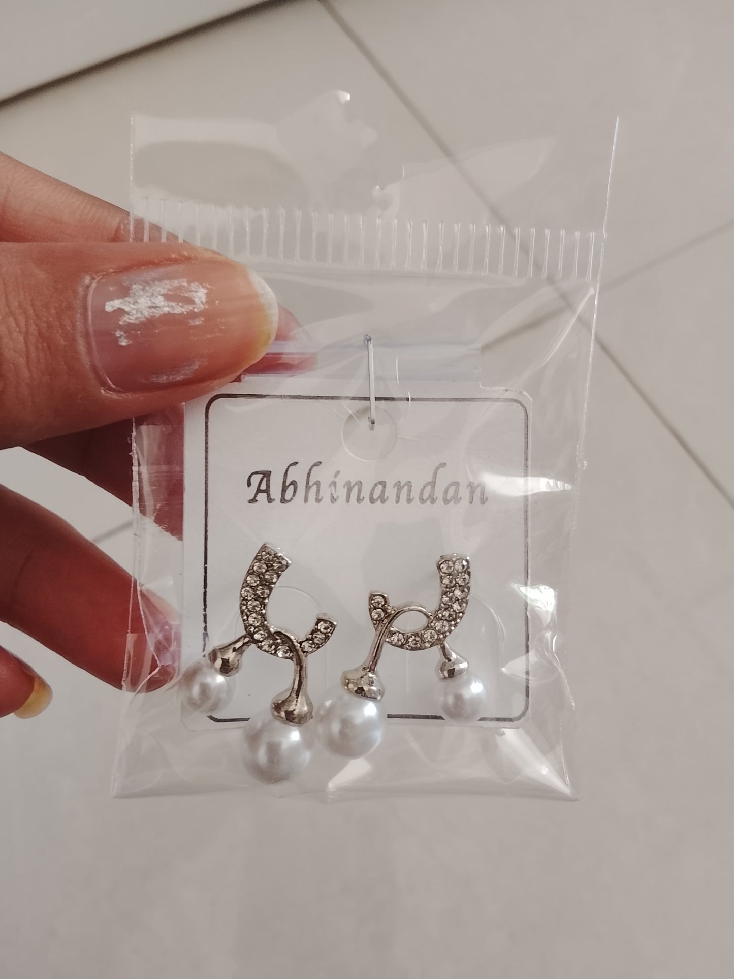 Elegant Pearl Drop Curve Earrings with Crystal Detailing