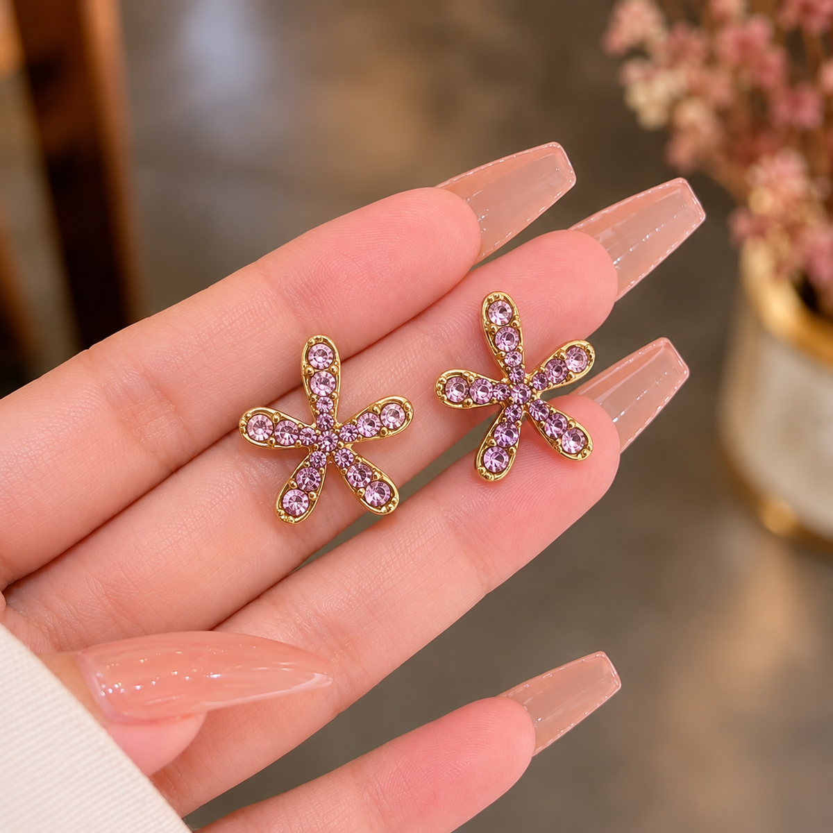 flower stud earring adorned with sparkling crystal stone
