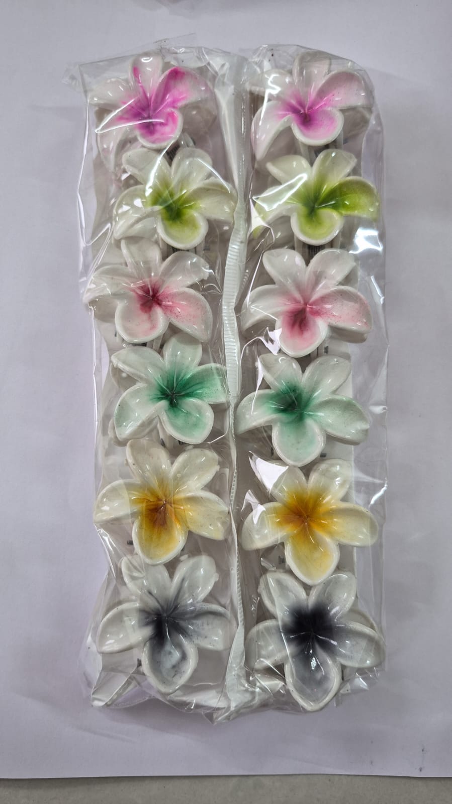 Small flower colourful clutcher
Set of 12