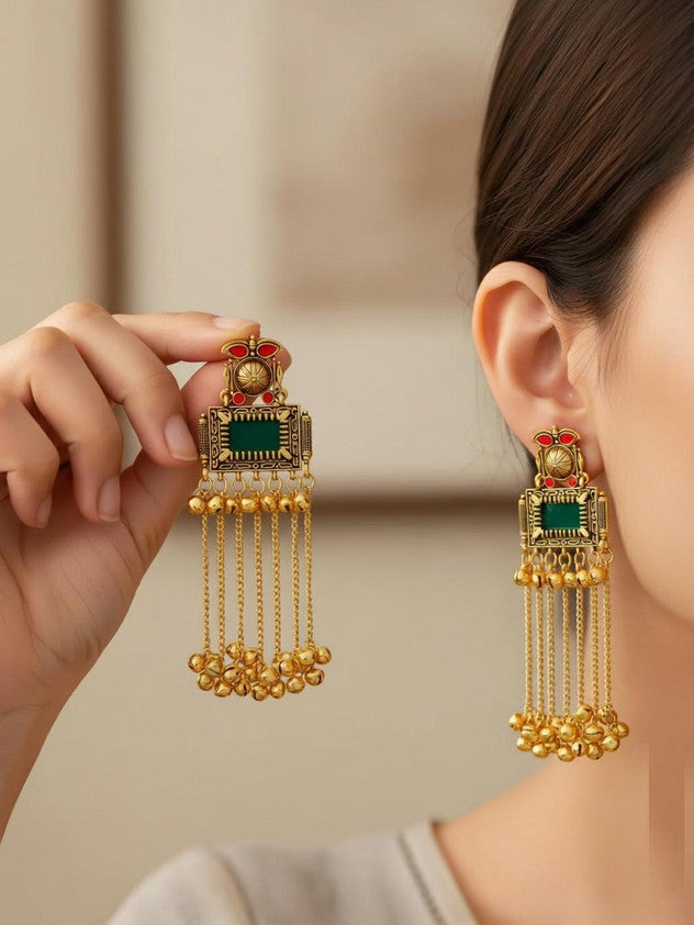 Kashmiri-style dangling earring with green stone hanging chain