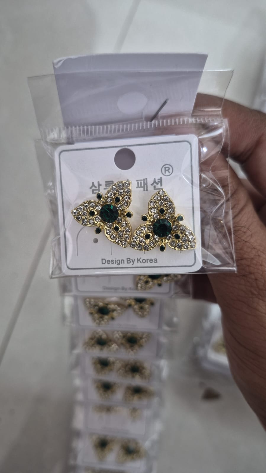 Emerald green flower design earrings