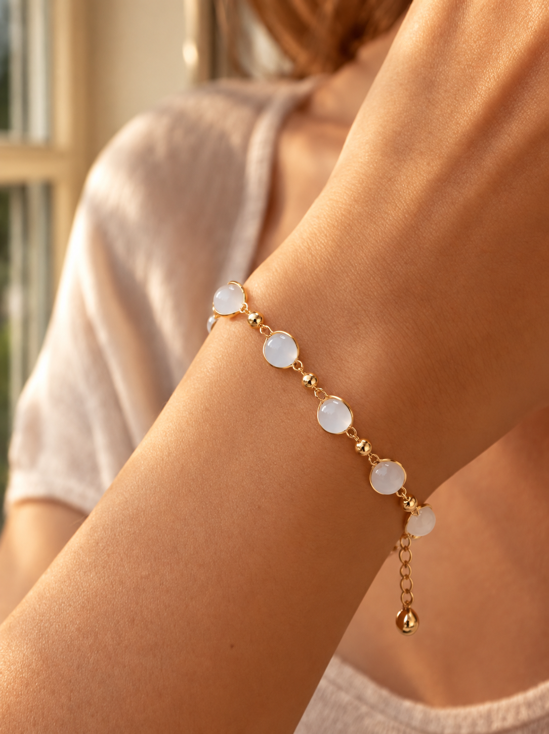 White pearl and golden adjustable chain bracelet