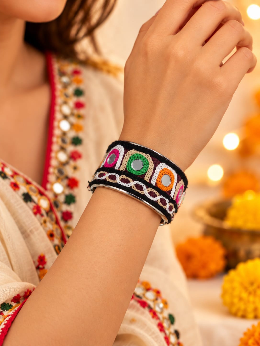 traditional Navratri mirror-work and thread-embroidered cuff bracelet (kada).