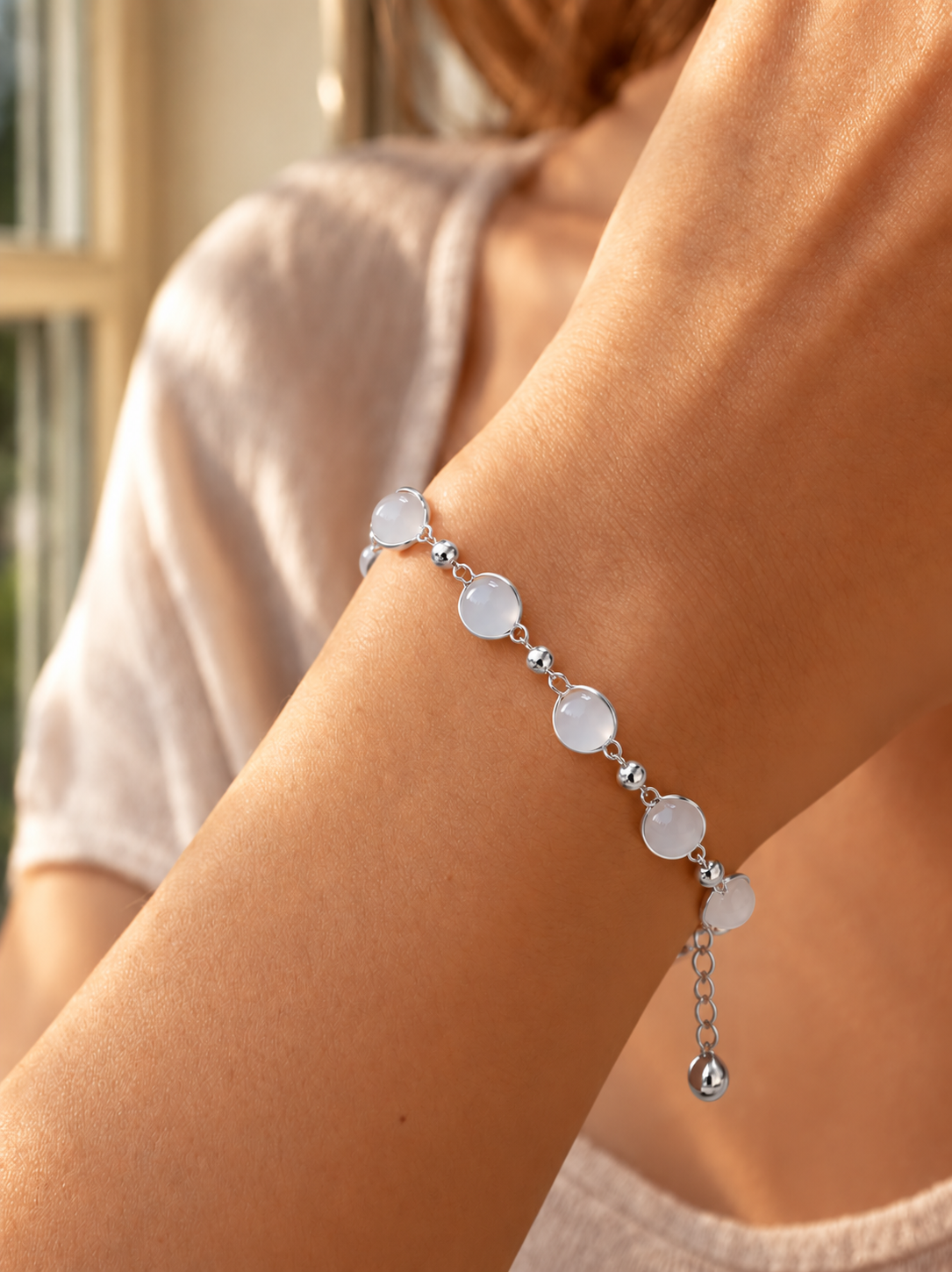White pearl and silver adjustable chain bracelet