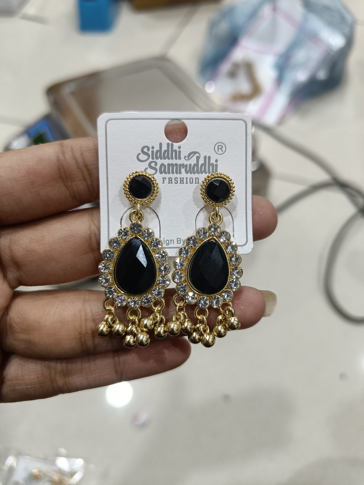 Black Teardrop Stone Crystal-Studded Gold-Tone Dangle Earrings