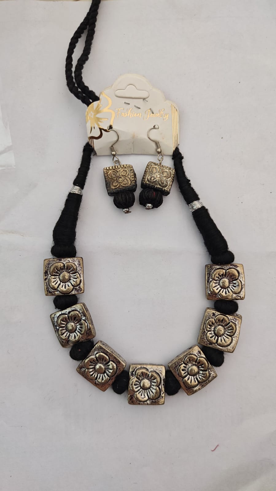 black thread and oxidized metal floral bead necklace earring set