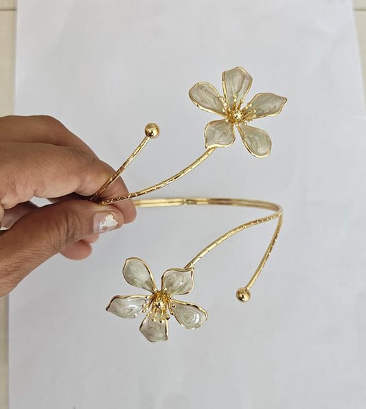 White enamel flower gold plated arm cuff