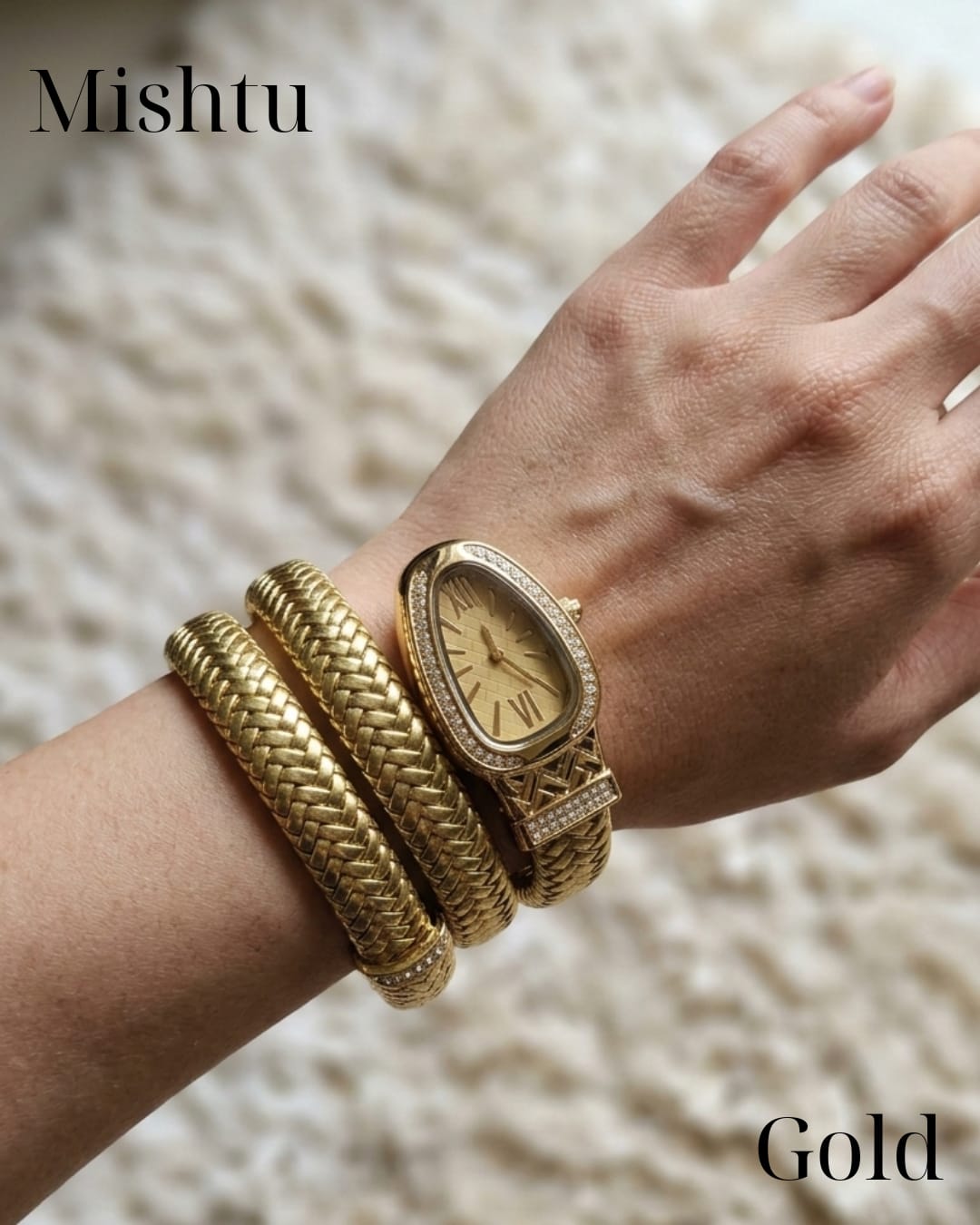Premium snake style wrist watch with gold dial