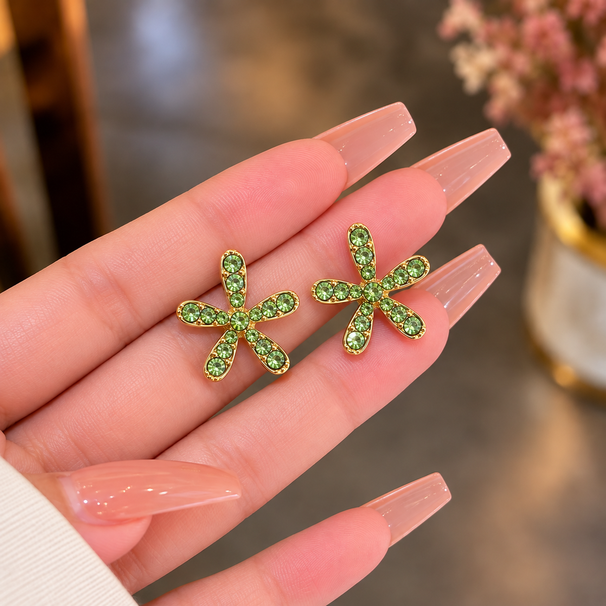 flower stud earring adorned with sparkling crystal stone