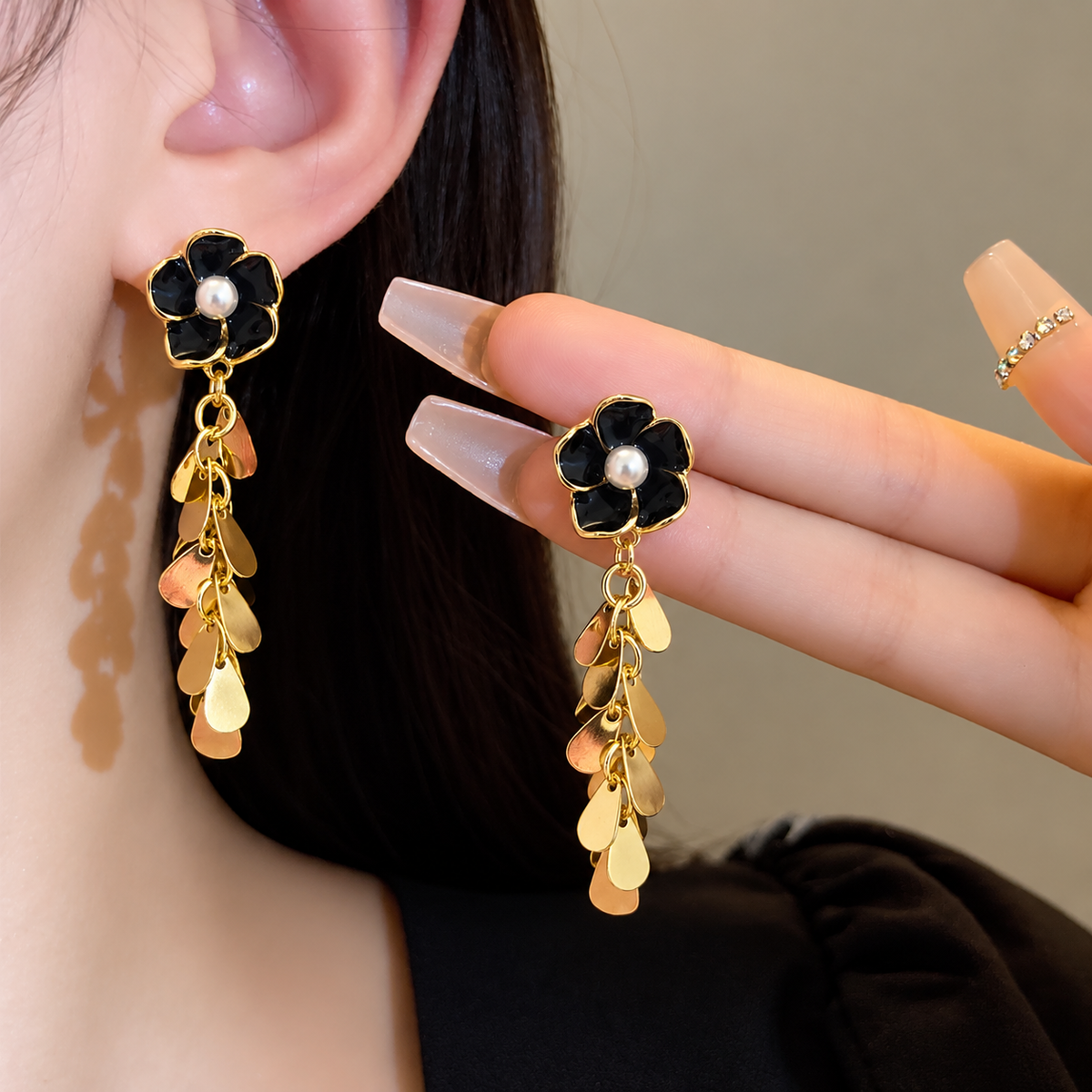 black enamelled flower stud-to-dangle earring
