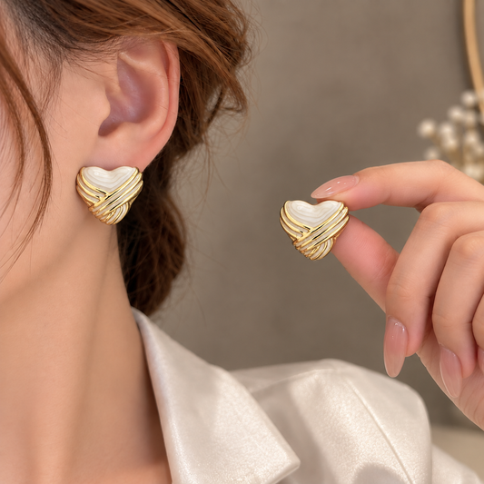 White. Enamel heart-shaped stud earrings