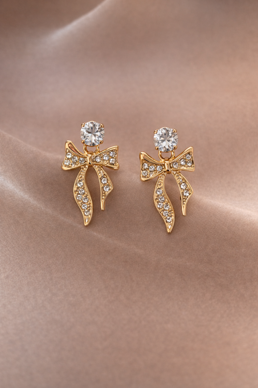 Sterling Silver Rhinestone Studded Bow Shaped Studs