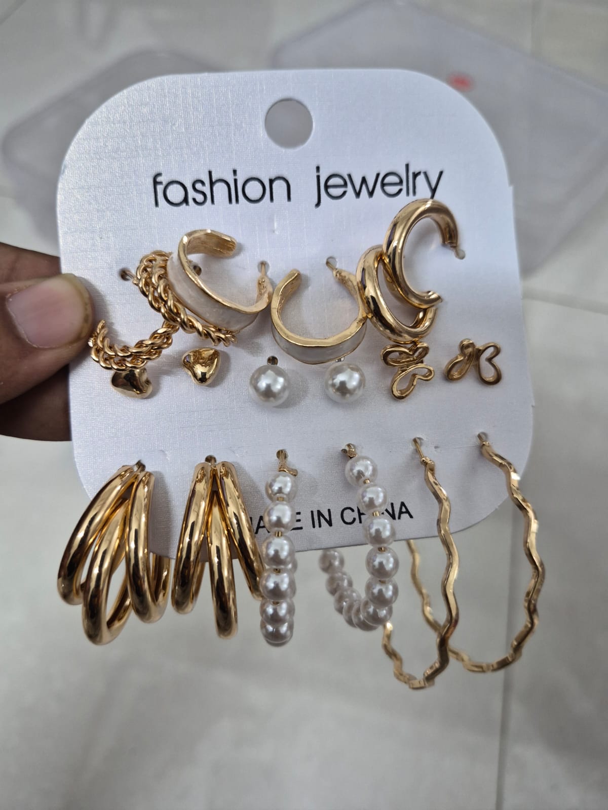 Set of 9 paira heart, pearl, butterfly and mix hoops combo