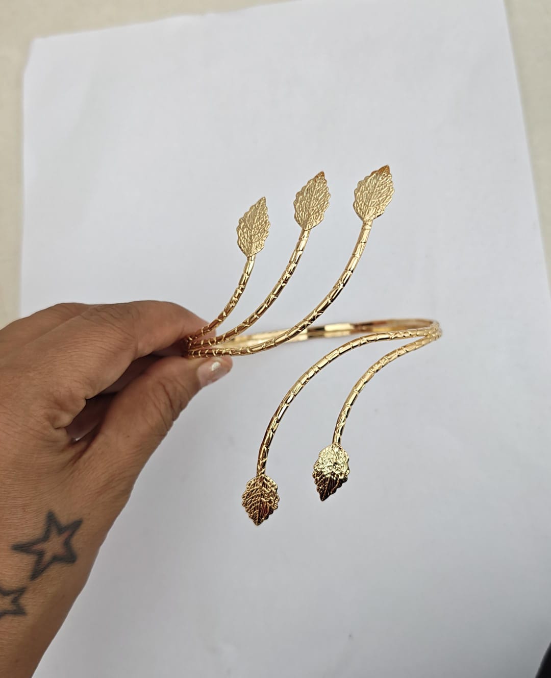 gold-plated arm cuff  open spiral leaf design
