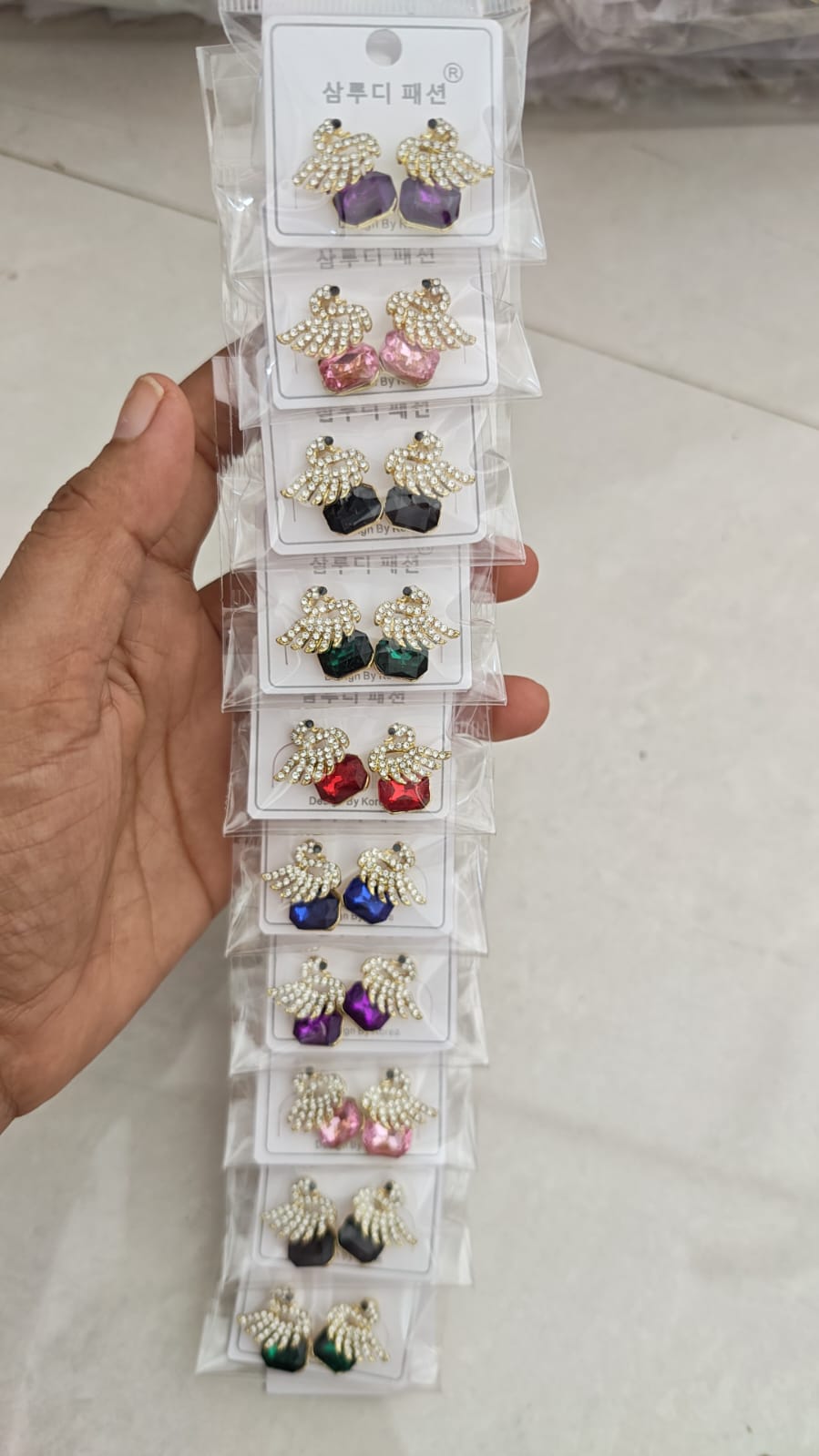 rhinestone-studded swan crystal stud earrings