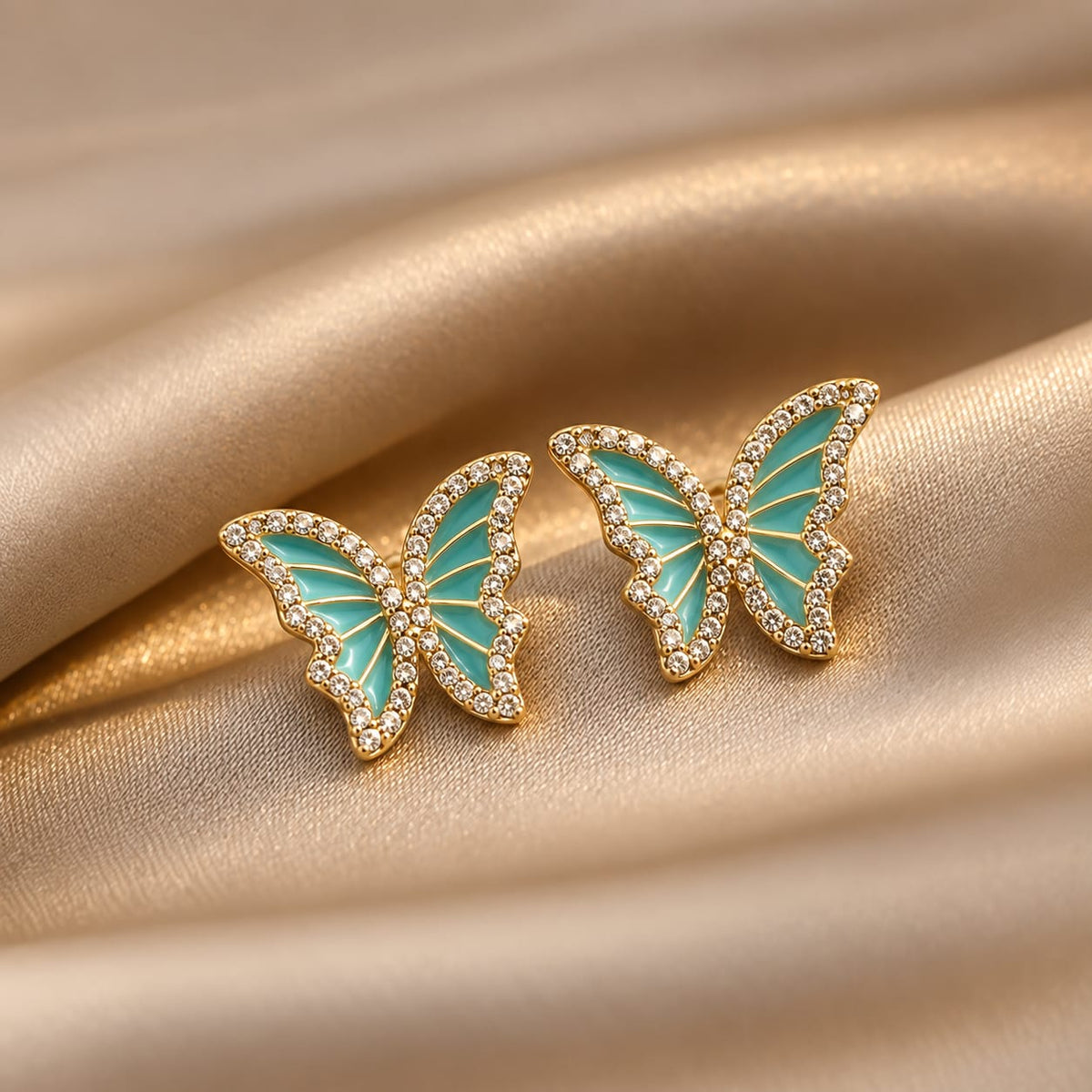 rhinestone-embellished butterfly enamel earrings