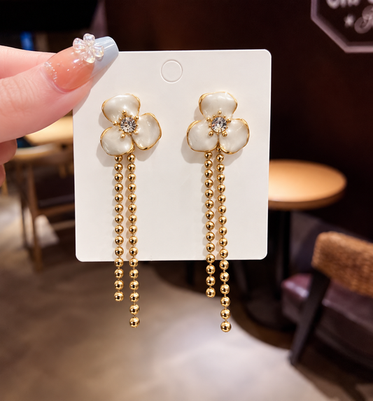 three-petaled white enamel flower stud earrings