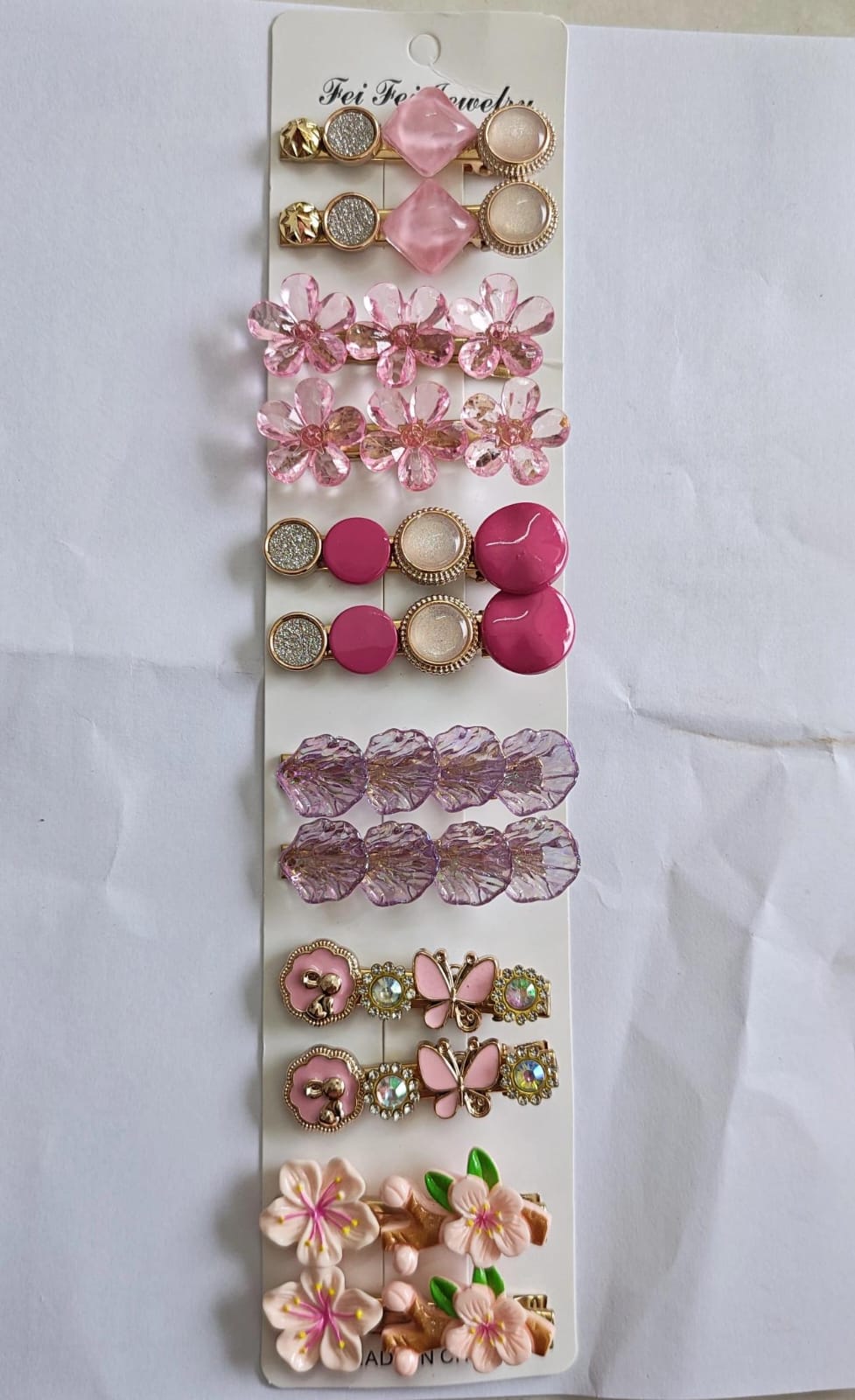 Set of 12 assorted pink and purple Korean-style designer hair clips