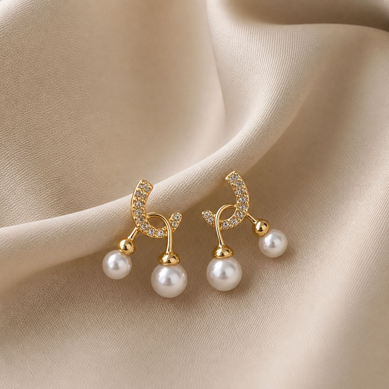 Elegant Pearl Drop Curve Earrings with Crystal Detailing