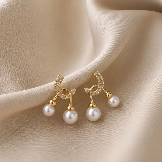 Elegant Pearl Drop Curve Earrings with Crystal Detailing