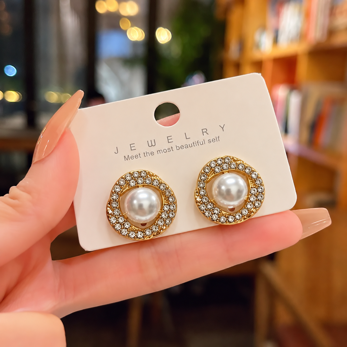 faux pearl and rhinestone halo stud earring