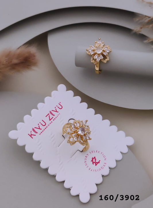 Gold-Tone Baguette Crystal Flower Ring ( rotate)