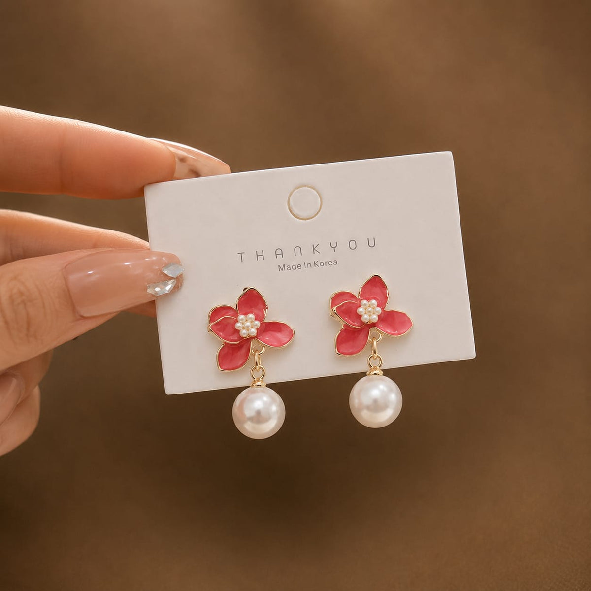 red enamel flower and pearl drop earring
