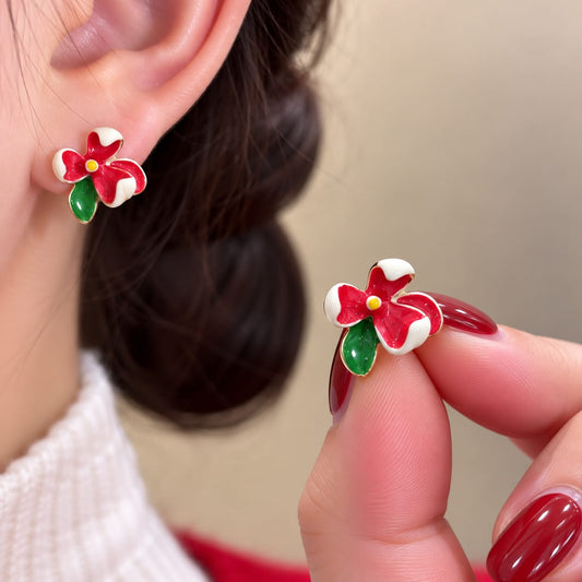 Flower Stud Earrings, featuring colorful enamel floral designs with green leaf accents.