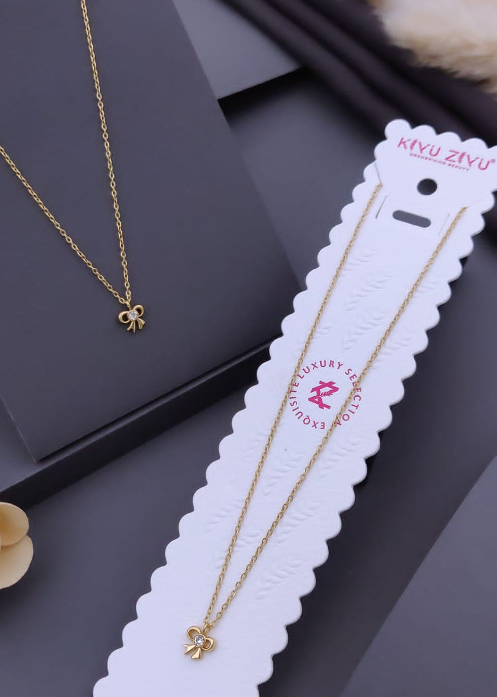 Gold-Tone Crystal Bow Pendant Necklace