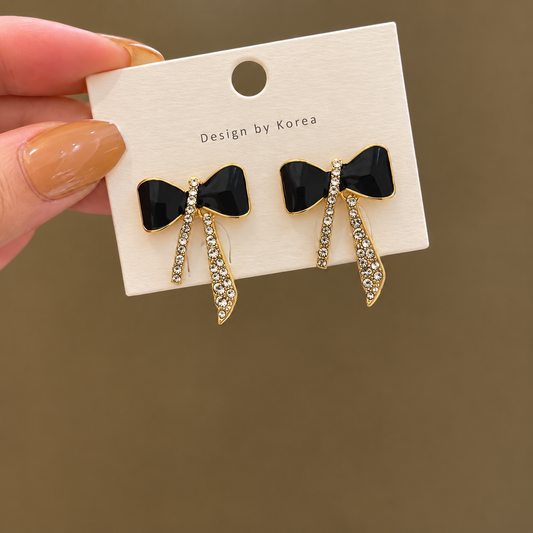 black enamel bow stud earrings with rhinestone