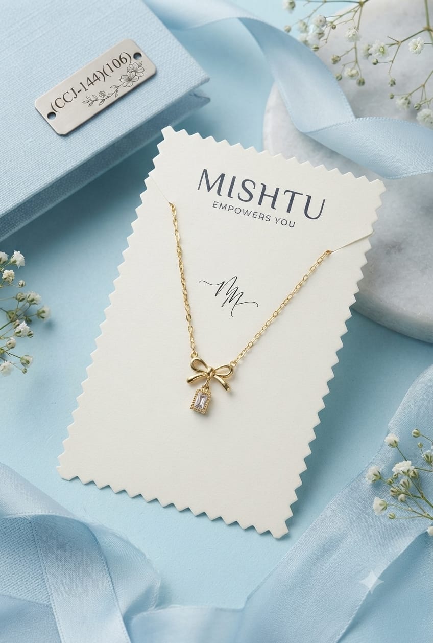 Gold-Tone Bow Charm Necklace with Crystal Pendant