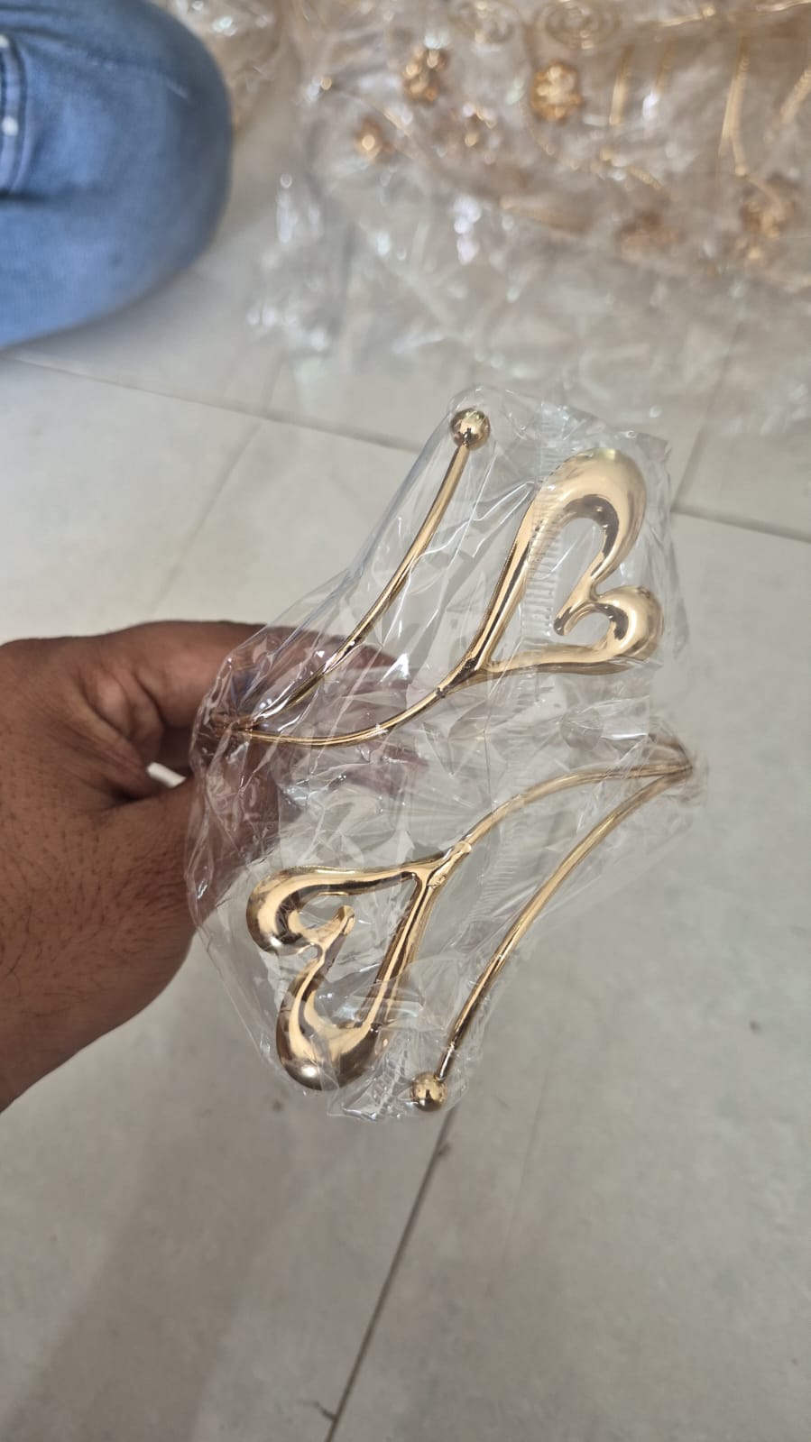 Gold-tone sculpted heart wrap adjustable arm cuff