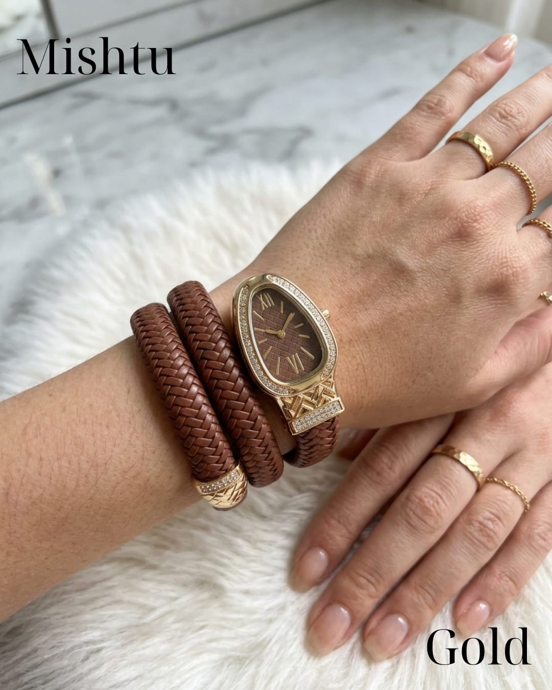 Premium snake style wrist watch with gold dial