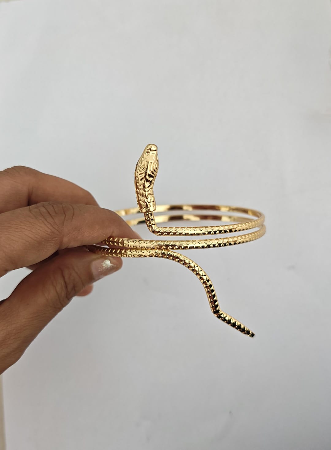 gold-toned alloy spiral snake arm cuff