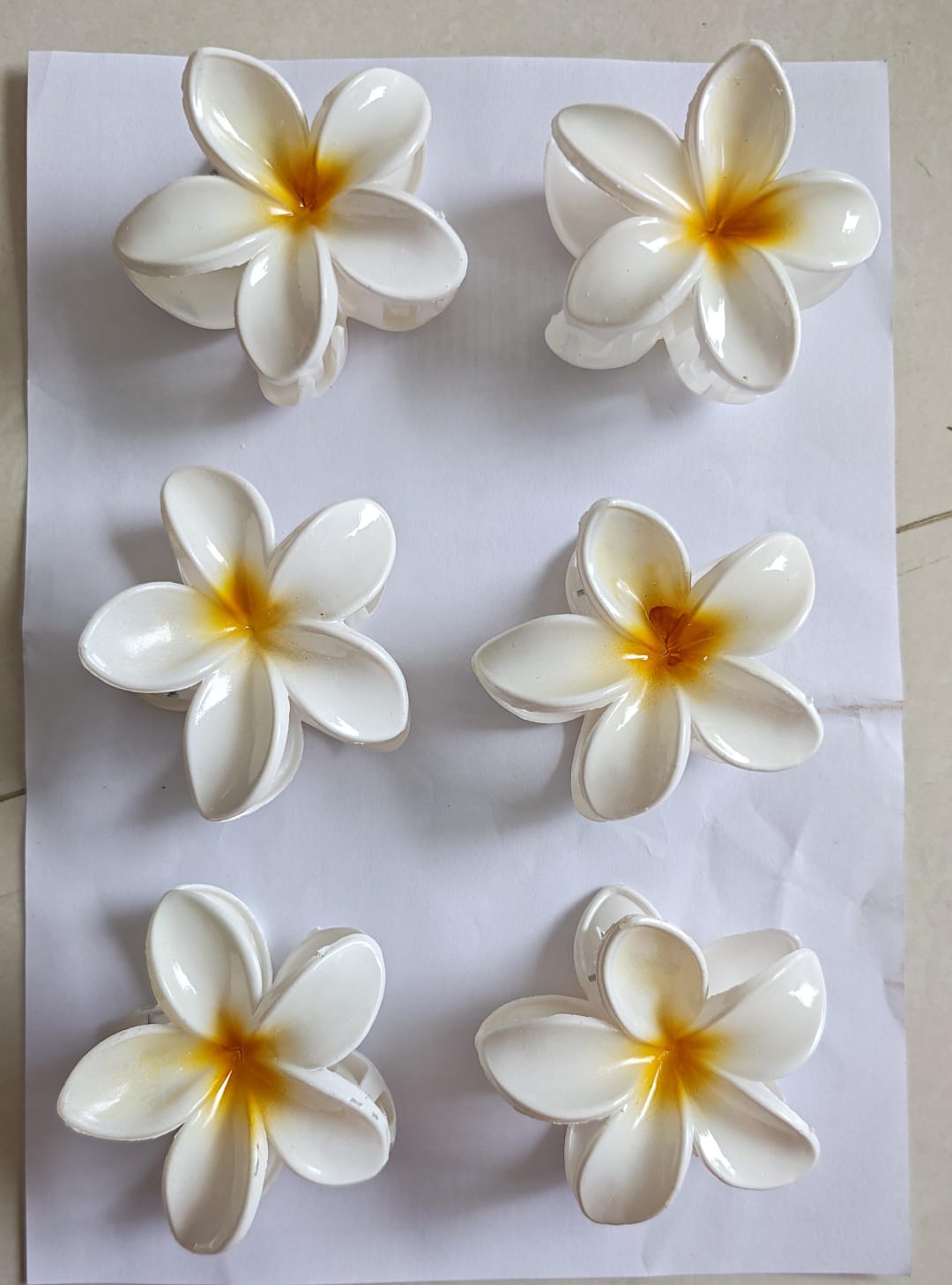 Suryamukhi flower hair claw set of 6