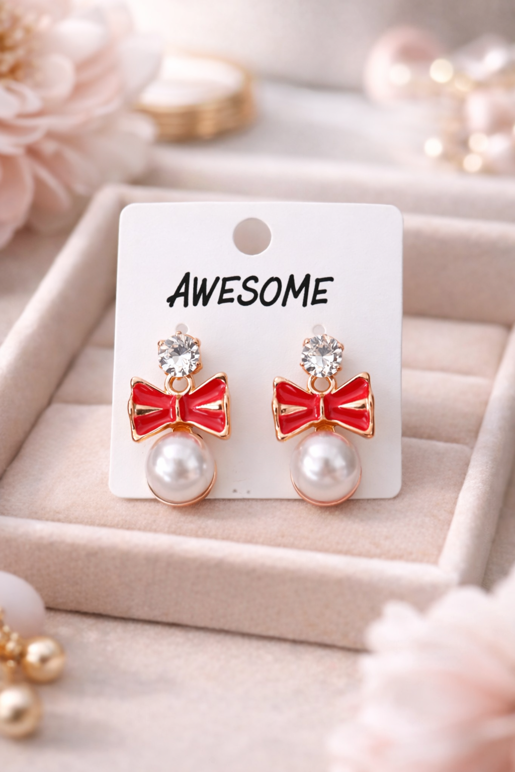 Red bow pearl drop earrings