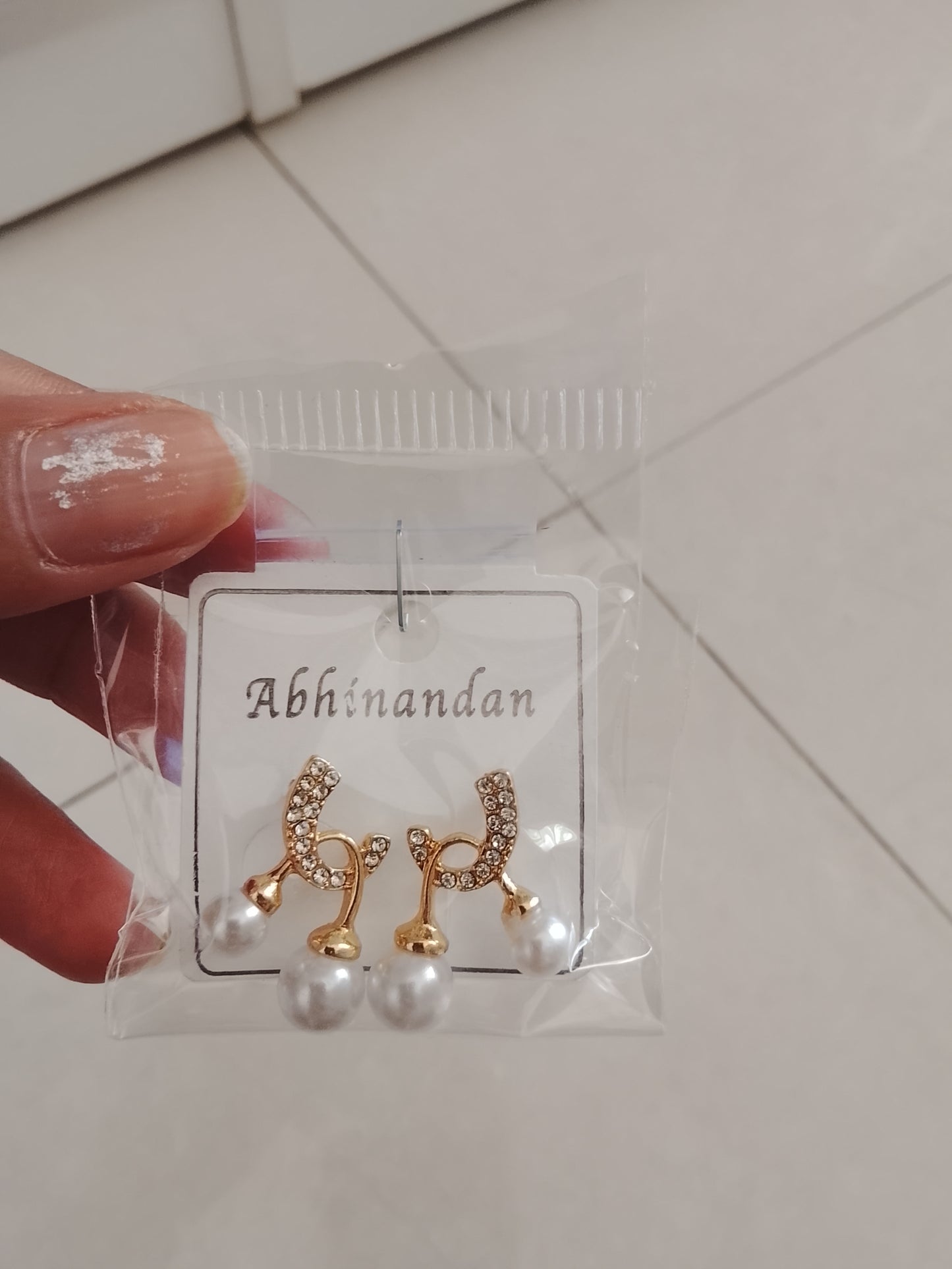 Elegant Pearl Drop Curve Earrings with Crystal Detailing
