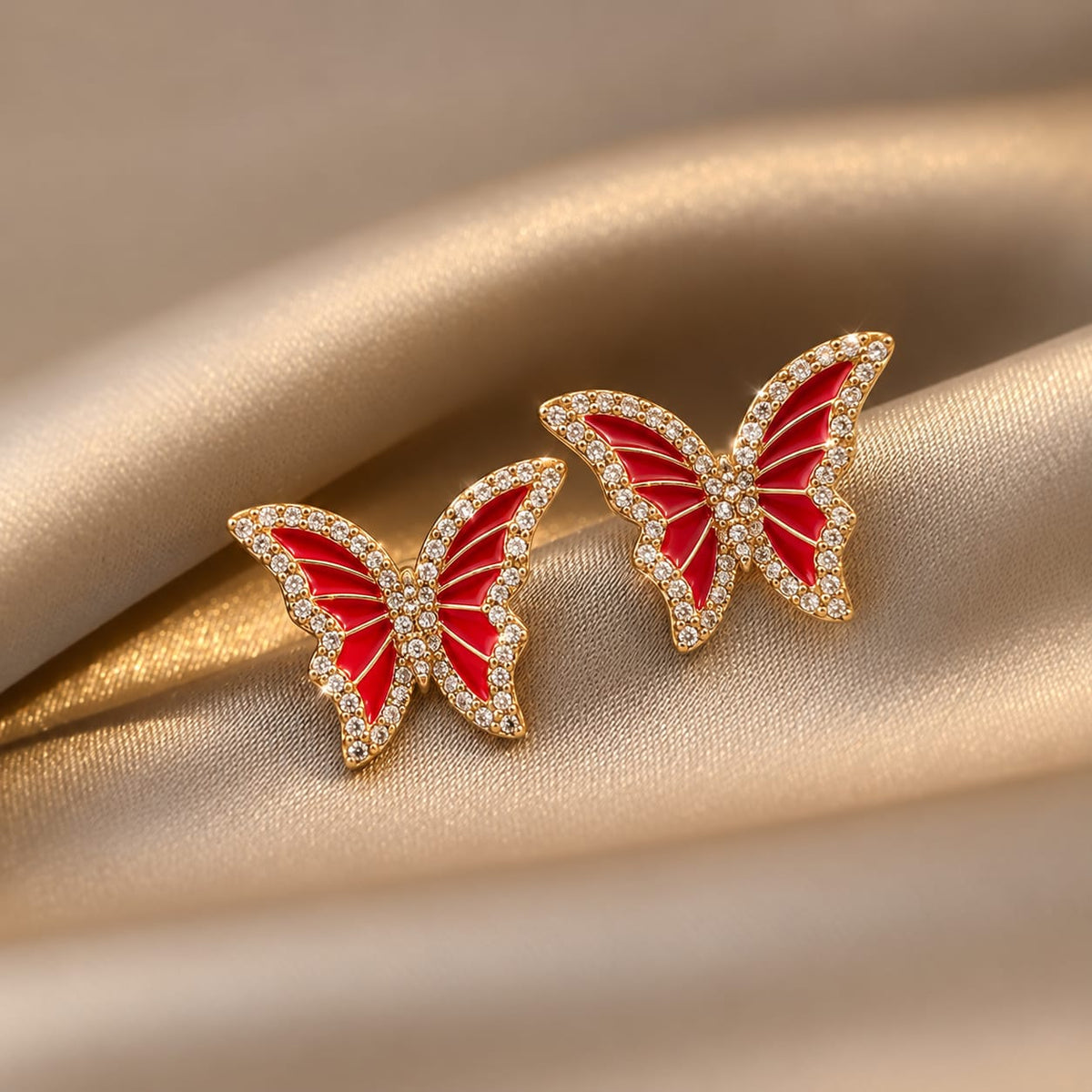 rhinestone-embellished butterfly enamel earrings
