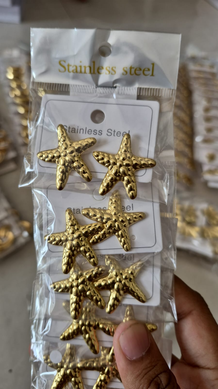 starfish-shaped stainless steel earring