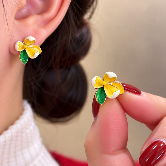 Flower Stud Earrings, featuring colorful enamel floral designs with green leaf accents.