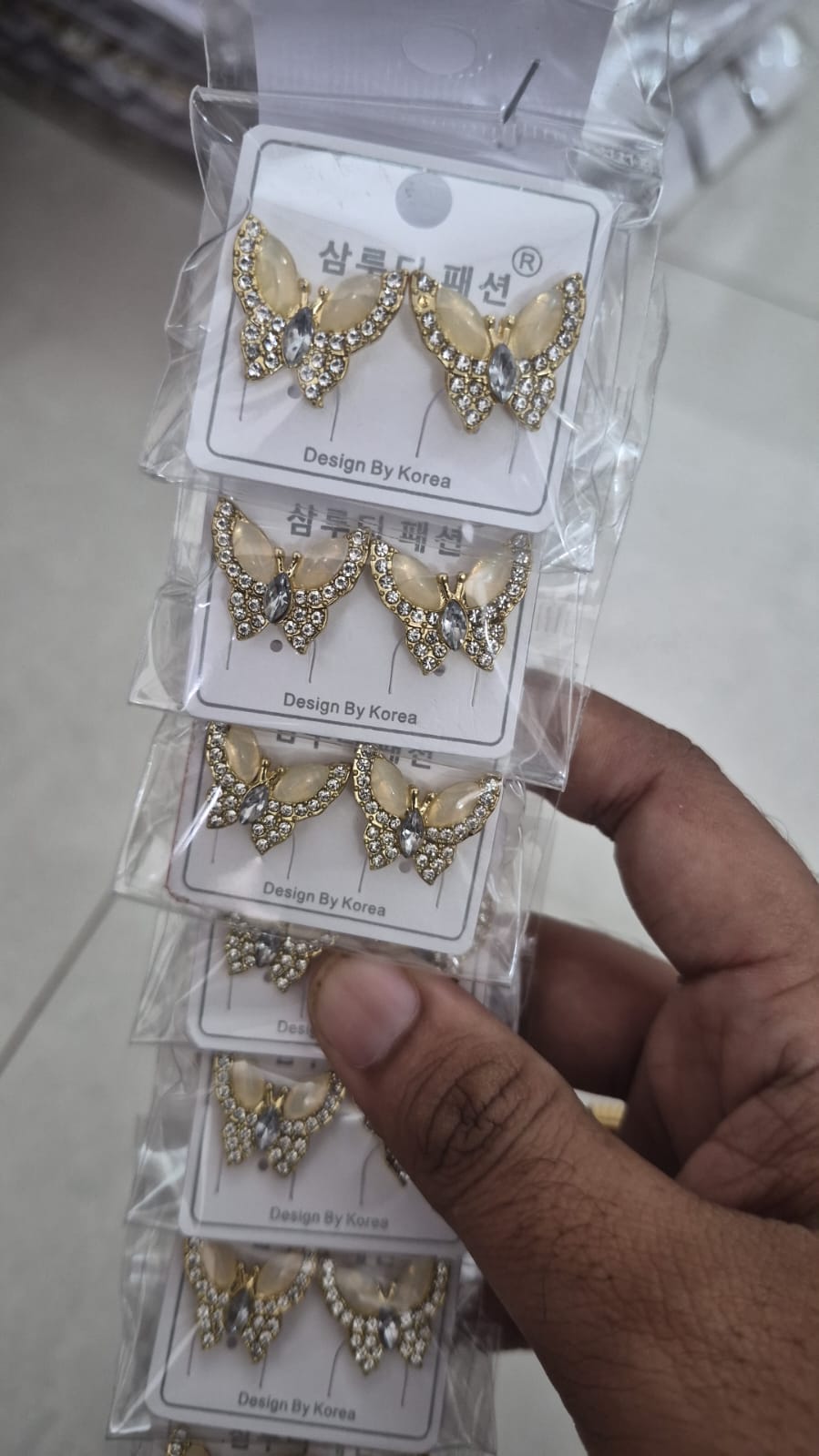 Monalisa butterfly stone stud