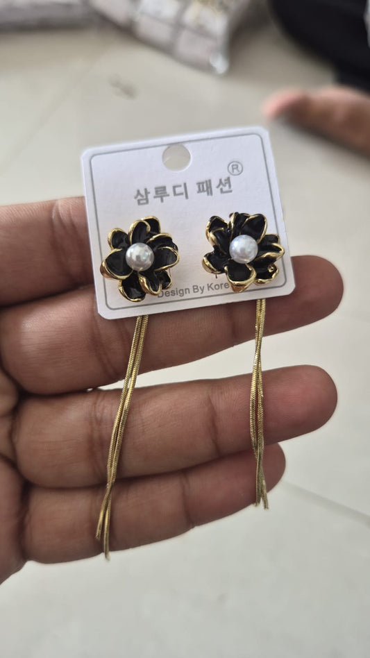 black enamelled flower earrings long dangling chain tassels.